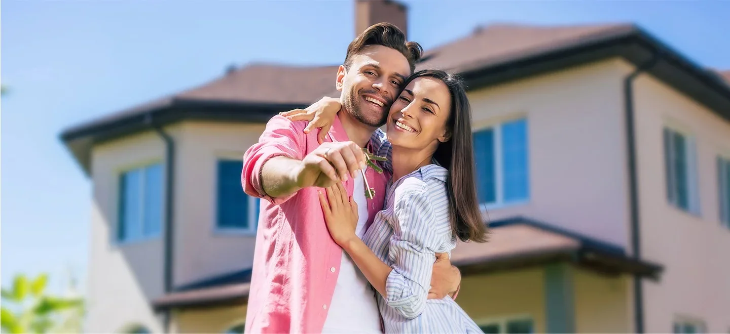Família em frente à sua casa